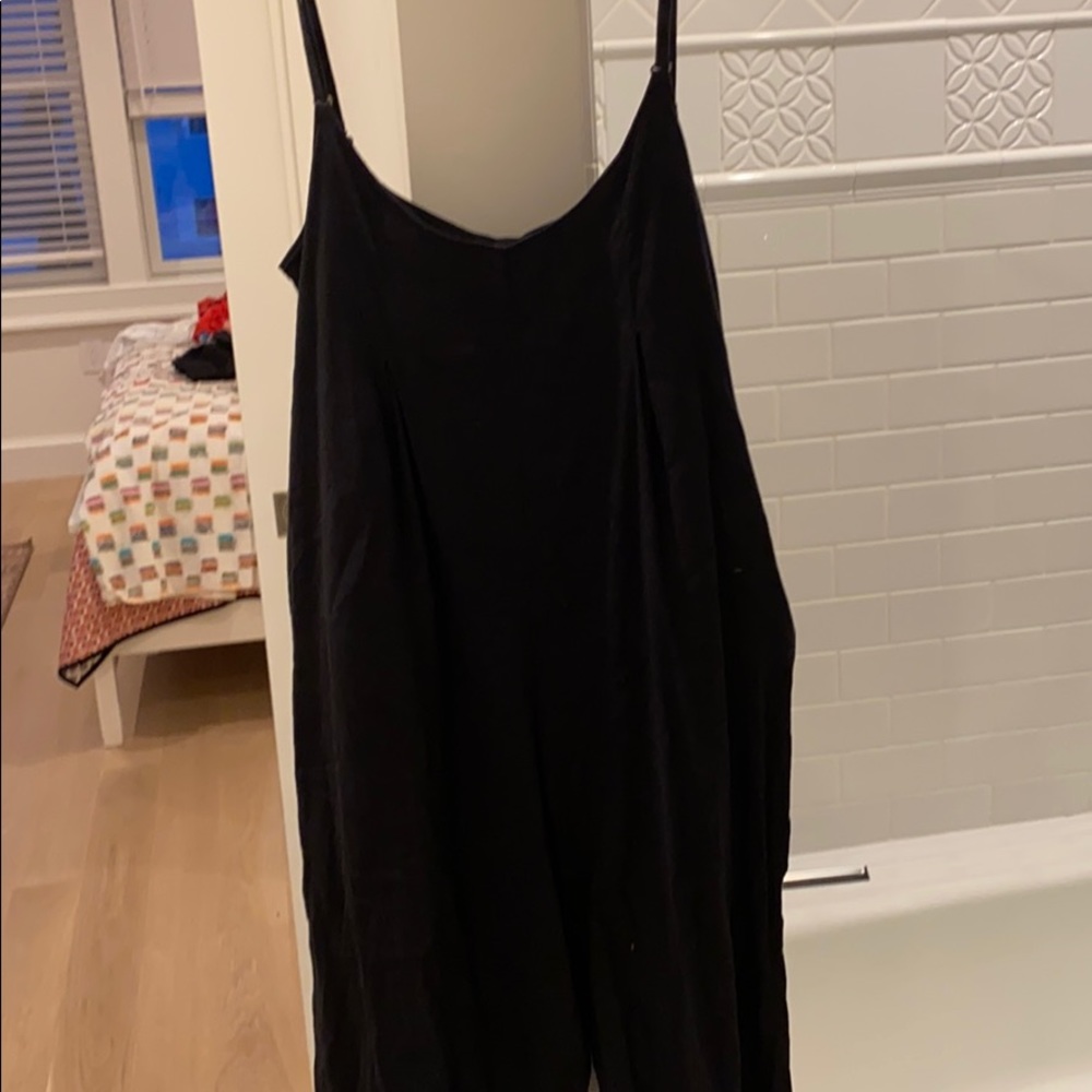 Black lightweight fabric onesie with pockets